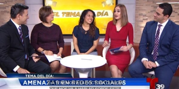 Dr. Claudia Porras Pyland speaking on a panel at Telemundo.